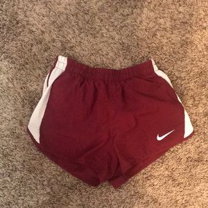 Maroon Nike shorts